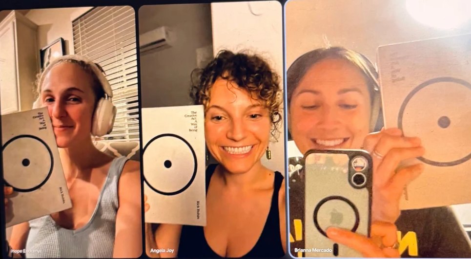 Three friends on a video call each holding up a copy of The Creative Act, Hope on the left in headphones